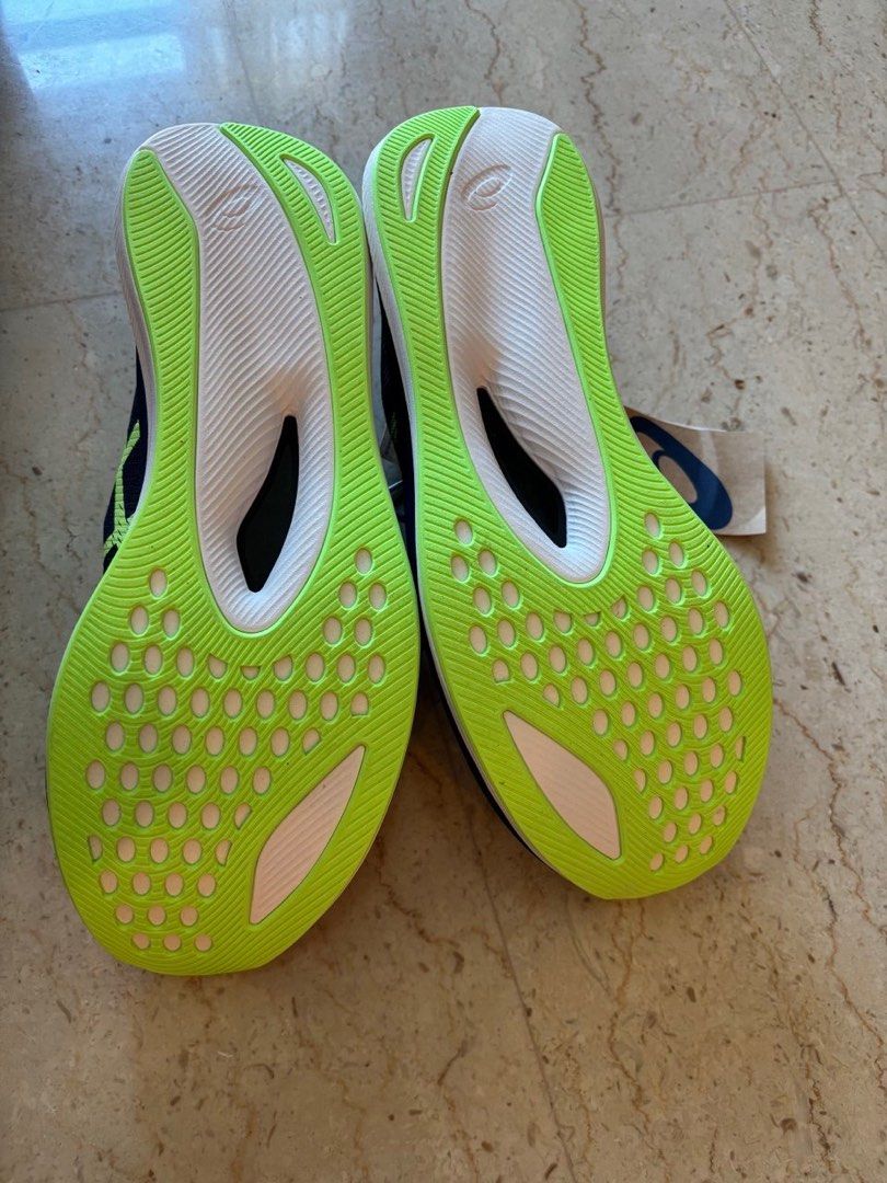 Brand New ASICS Magic Speed 3 Running Shoes (Category: Sneakers) located in Singapore. Submitted by nyctophilynn (Listing ID 1377676547, Image 2). Description: Brand new ASICS Magic Speed running shoes. Navy blue with neon yellow accents. No original box, but never worn before. Size 45 (EU), 10 (UK), 11 (US). .