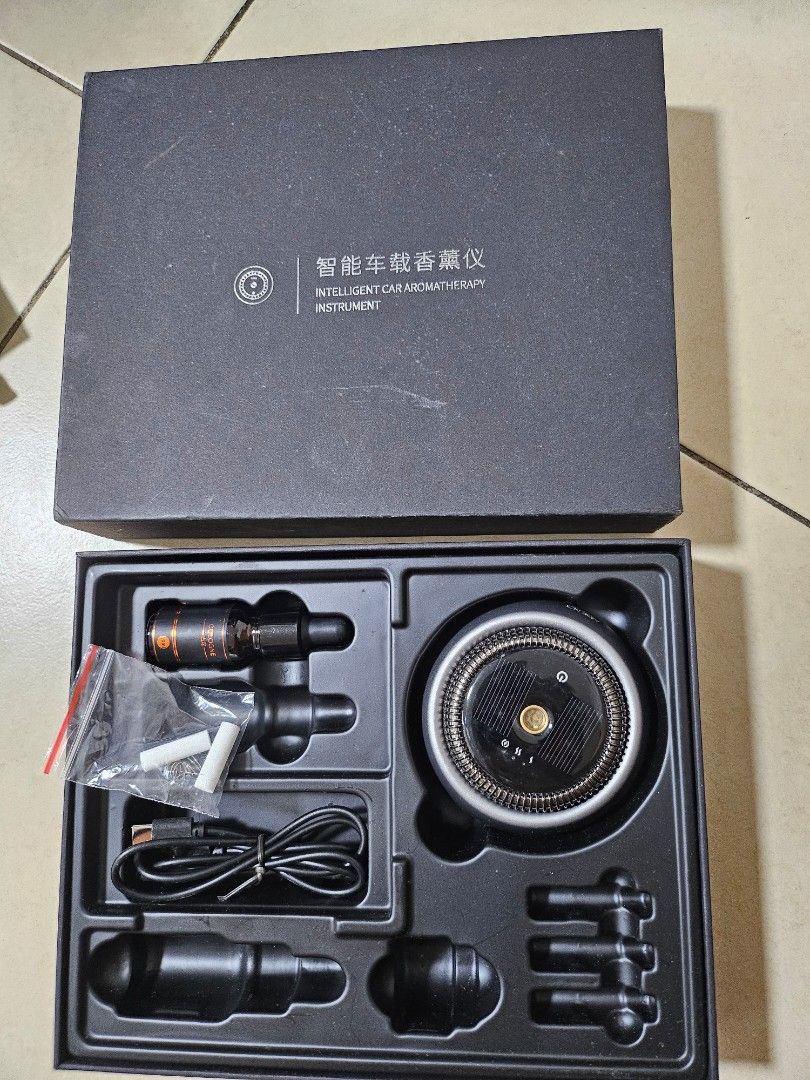 car electronics diffuser (Category: Other Electronics) located in Singapore. Submitted by jasonhe (Listing ID 1377698406, Image 1). Description: used car electronics diffuser. solar/cable charger. still got half bottle of essential oil..