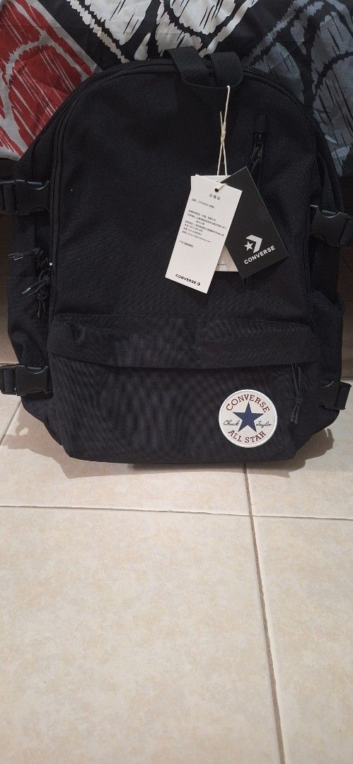 Backpack (Category: Backpacks) located in Singapore. Submitted by mr_han19 (Listing ID 1377602843, Image 1). Description: - Brand new Converse backpack - Classic black design - Features the iconic Converse logo - Perfect for everyday use, school, or travel - Multiple compartments for organization.