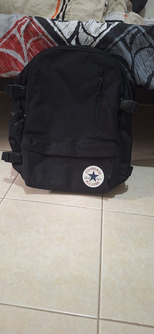 Backpack (Category: Backpacks) located in Singapore. Submitted by mr_han19 (Listing ID 1377602843, Image 2). Description: - Brand new Converse backpack - Classic black design - Features the iconic Converse logo - Perfect for everyday use, school, or travel - Multiple compartments for organization.
