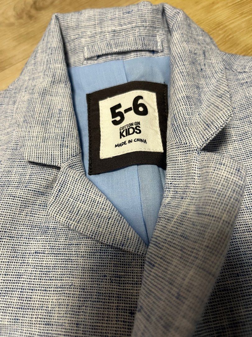 Cotton On kids blazer jacket (Category: Babies & Kids Fashion) located in Singapore. Submitted by charichris (Listing ID 1377743797, Image 2). Description: - Light blue.