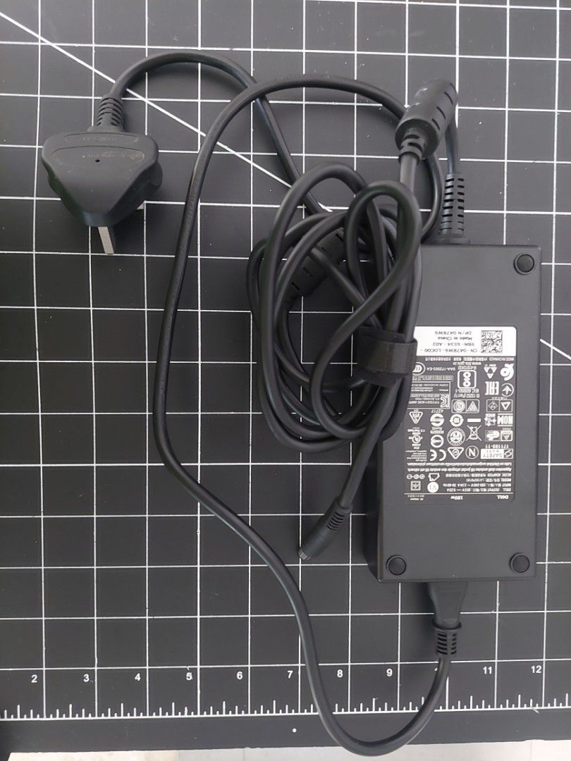 Dell Laptop Charger (Category: Chargers) located in Singapore. Submitted by leowww1 (Listing ID 1377573088, Image 1). Description: - Genuine Dell charger - Excellent condition - Includes power brick and cable - Ready to use - Please check laptop compatibility.