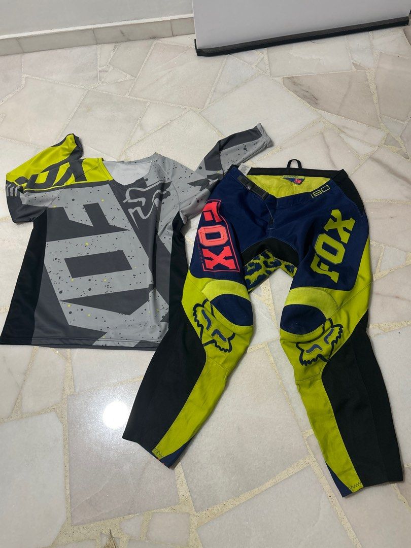 Fox 180 Motocross Jersey and Pants Set (Category: Motorcycle Apparel) located in Singapore. Submitted by kamasutra88 (Listing ID 1377679611, Image 2). Description: Fox 180 motocross jersey and pants set. Includes a long-sleeved jersey and matching pants. The pants are size 7/8. The set features a grey, yellow, and black color scheme with Fox branding. Great for motocross enthusiasts..