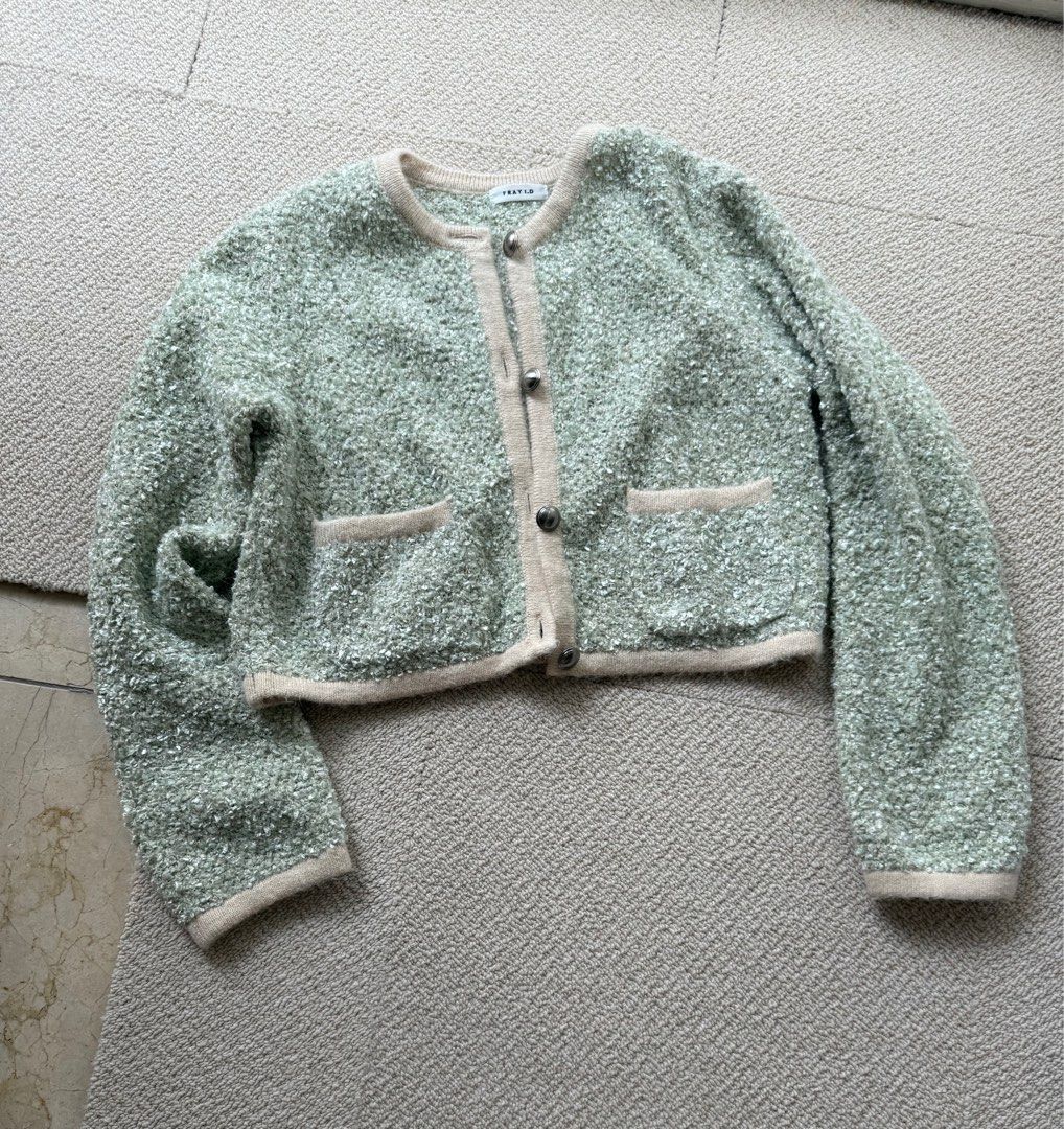 FRAY I.D Textured Mint Green Cardigan (Category: Coats, Jackets and Outerwear) located in Singapore. Submitted by hillaryzabc (Listing ID 1377593300, Image 1). Description: Gorgeous FRAY I.D cardigan in a unique textured knit. Features a lovely mint green color with beige trim and buttons. Includes two front pockets. Perfect for layering and adding a touch of elegance to any outfit. One size. Like new. RTP at Lumine: SGD 300+.