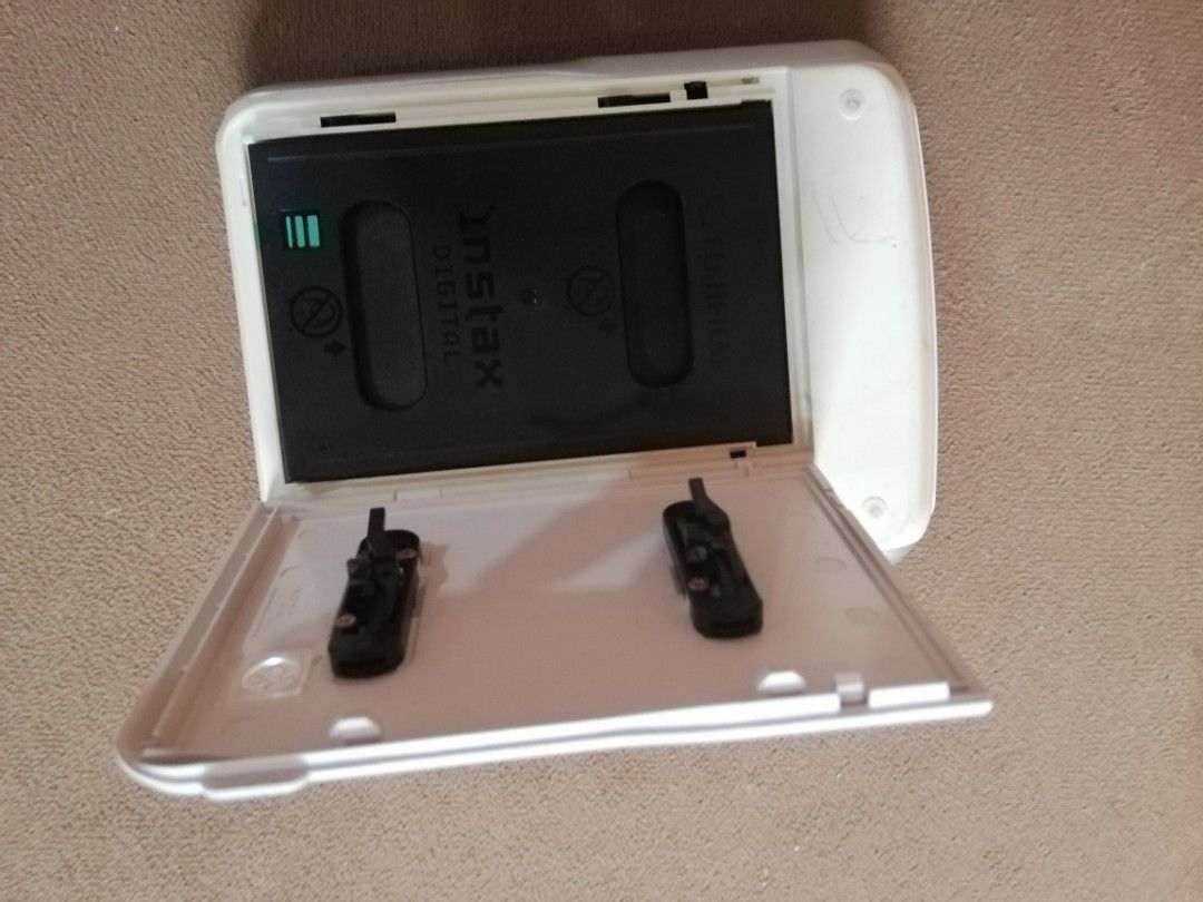 Fuji instax digital mobile printer (Category: Printers, Scanners & Copiers) located in Quezon City. Submitted by goldencity1964 (Listing ID 1377626274, Image 3). Description: Fuji Digital Instax mobile printer UNTESTED.... WYSIWYG... SELLING AS IS...