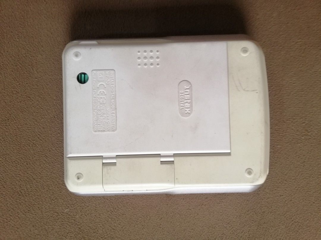 Fuji instax digital mobile printer (Category: Printers, Scanners & Copiers) located in Quezon City. Submitted by goldencity1964 (Listing ID 1377626274, Image 2). Description: Fuji Digital Instax mobile printer UNTESTED.... WYSIWYG... SELLING AS IS...