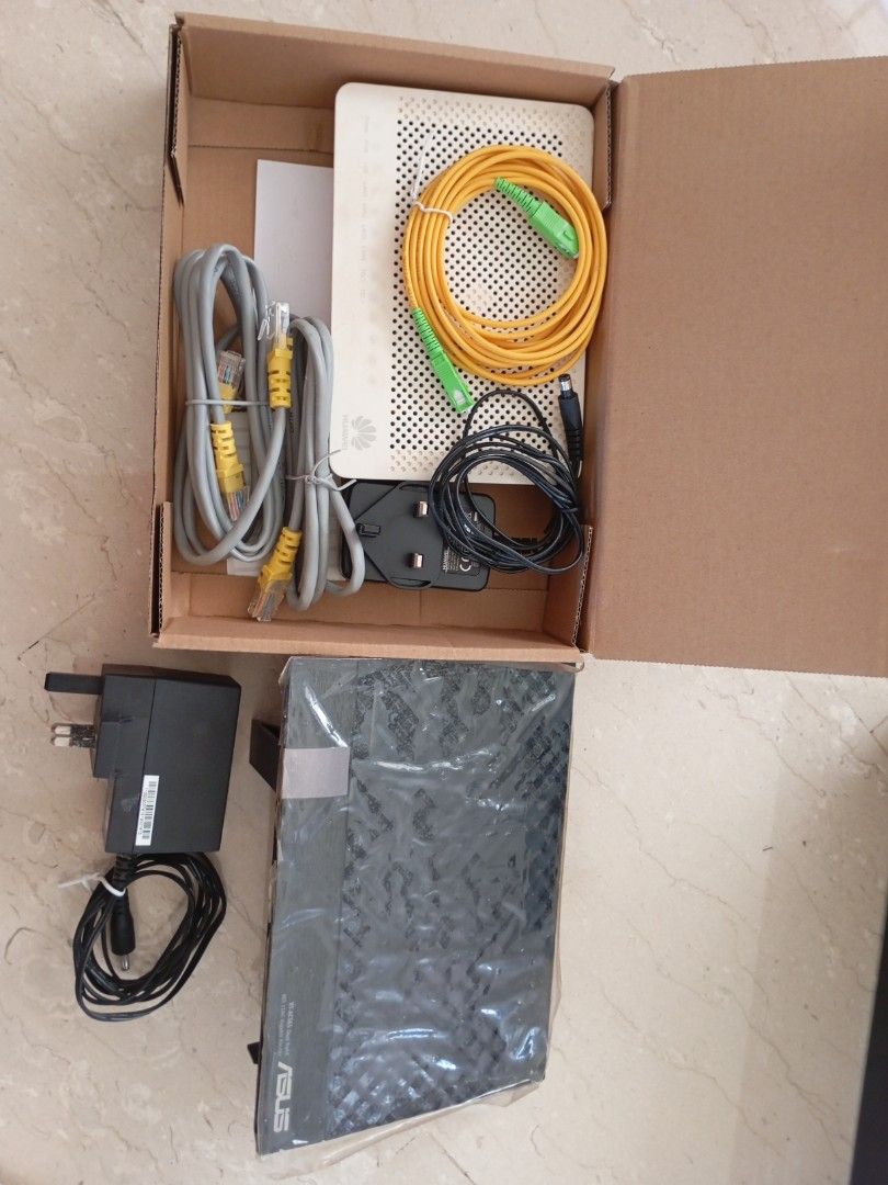 Huawei Modem + ASUS Router Set (With Cables & Power Adapters) (Category: Networking) located in Singapore. Submitted by hsuchongnan (Listing ID 1377655161, Image 1). Description: Items Included: 1. Huawei HG8240T GPON Terminal (White) With power adapter Comes with fiber optic cable, LAN cables Ports: 4x LAN, 2x TEL Used for fibre optic internet (used by Singtel, StarHub, etc.) 2. ASUS RT-AC1200 Dual-Band WiFi Router (Black) Still in plastic wrap 
