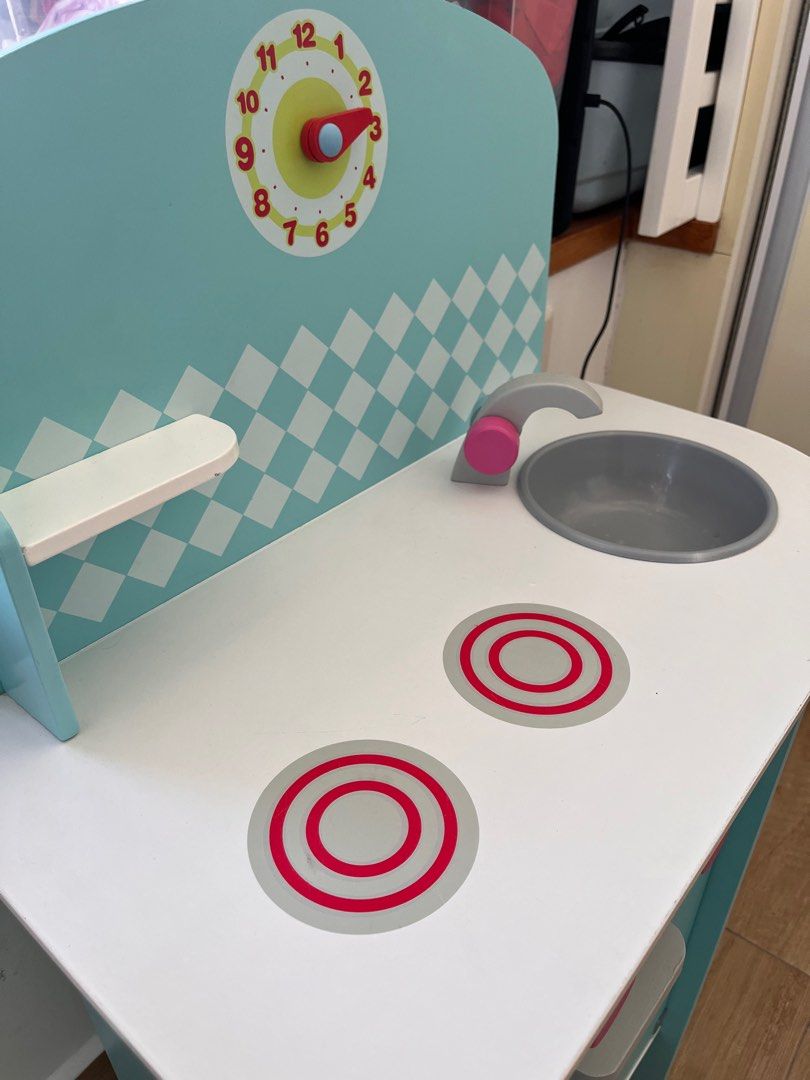 QUICK SALE! J'adore Wooden Toy Kitchen (Category: Infant Playtime) located in Singapore. Submitted by jomojom (Listing ID 1377656666, Image 2). Description: J'adore wooden toy kitchen in excellent condition. Includes only a limited number of kitchen toys. .