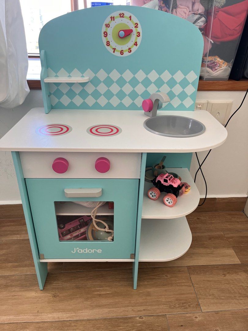 QUICK SALE! J'adore Wooden Toy Kitchen (Category: Infant Playtime) located in Singapore. Submitted by jomojom (Listing ID 1377656666, Image 3). Description: J'adore wooden toy kitchen in excellent condition. Includes only a limited number of kitchen toys. .