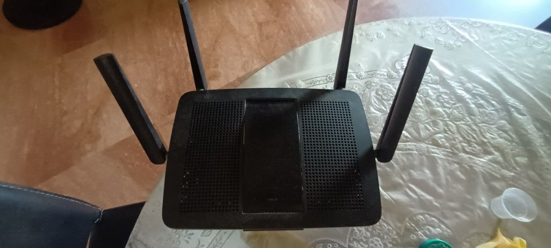 Linksys EA8100 Router (Category: Networking) located in Singapore. Submitted by haribol2010 (Listing ID 1377576940, Image 1). Description: - Used Linksys EA8100 router - Black color - Includes four antennas - Tested and working - Suitable for home or small office use - See photos for condition.