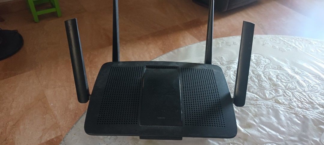 Linksys EA8100 Router (Category: Networking) located in Singapore. Submitted by haribol2010 (Listing ID 1377576940, Image 2). Description: - Used Linksys EA8100 router - Black color - Includes four antennas - Tested and working - Suitable for home or small office use - See photos for condition.