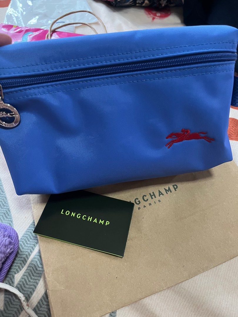 Longchamp Le pliage cosmetic pouch (Category: Purses & Pouches) located in Mandaluyong City. Submitted by stephmd (Listing ID 1377653086, Image 2). Description: 100% original from Italy With paperbag and care brochure 100% Brand new Material is Nylon with leather pull on the side Loc Mandaluyong LBC COP or j&T shipping .