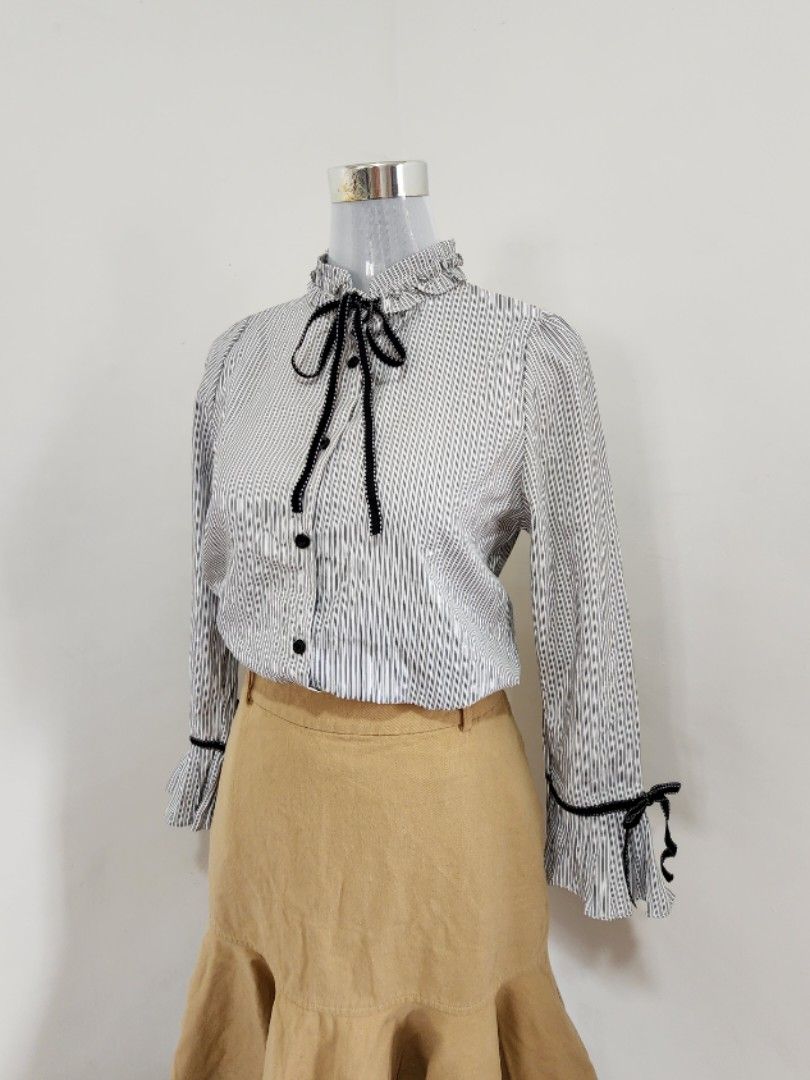 Longsleeve Blouse with Ribbon Accents (Category: Blouses) located in Tarlac. Submitted by on.cloud_lmc (Listing ID 1377686782, Image 1). Description: Sold as is. Like new, only needs wash. See last 2 photos for actual dimes. Shipping to be shouldered by the buyer. PM na po 😊.