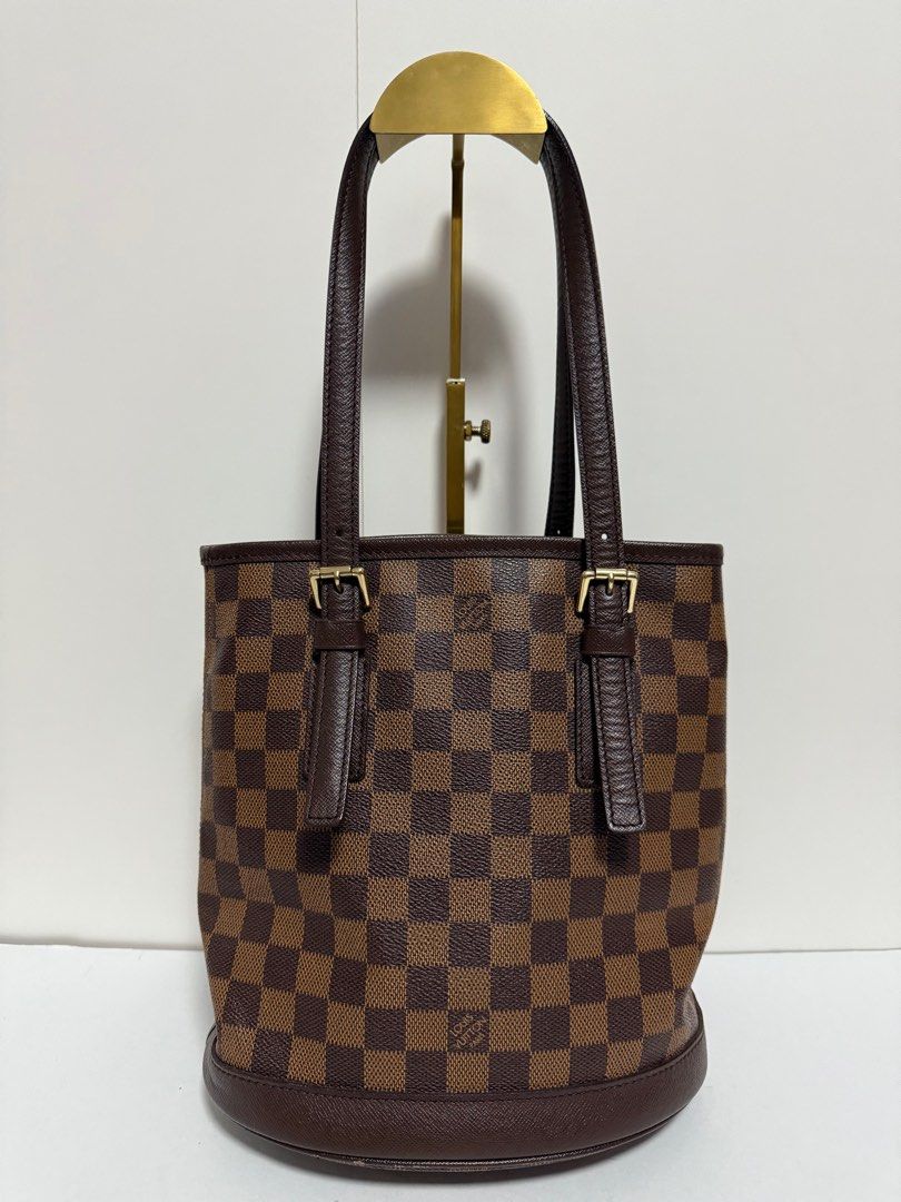 Louis Vuitton Damier Marais Bucket Bag (Category: Luxury Bags & Wallets) located in Imus. Submitted by trishyyyy (Listing ID 1377690805, Image 2). Description: Mini pochette same date code with the marais bucket bag!!! Rare finds super condition pa 💯.