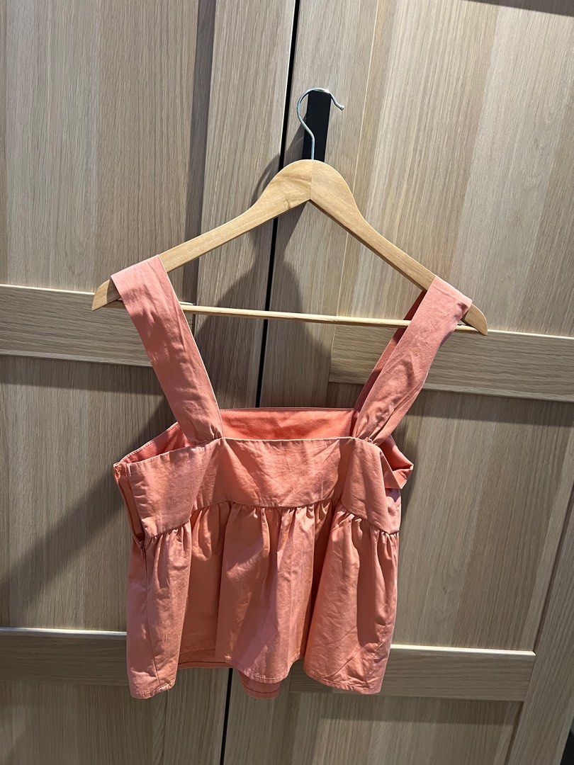 Mango orange blouse (Category: Sleeveless) located in Muntinlupa City. Submitted by Ariom (Listing ID 1377663427, Image 2). Description: Mango orange sleeveless top. Size: XS *color may vary due to lighting 📍 Muntinlupa Delivery shouldered by buyer. Gogo Xpress! Mop: gcash, bpi, bdo.