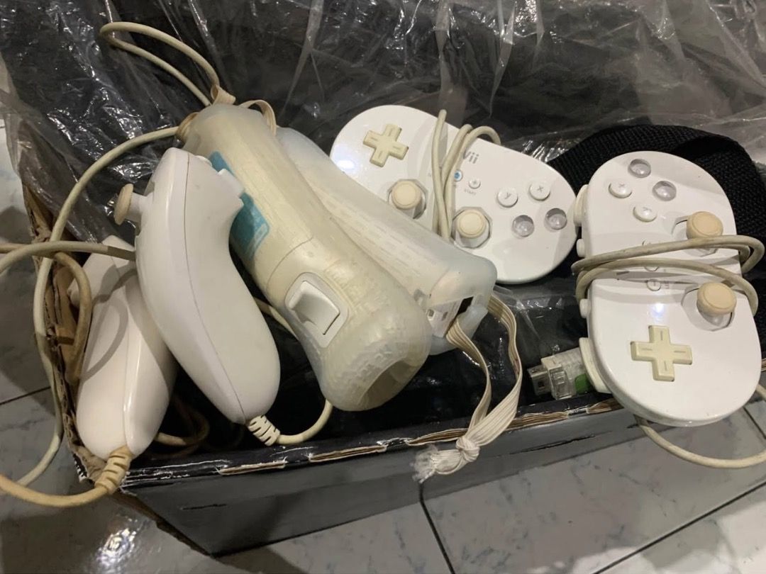 Nintendo Wii with complete rockband package +games (Category: Nintendo) located in Quezon City. Submitted by finderskipers (Listing ID 1377694805, Image 3). Description: nintendo wii with 2 consoles and complete rockband bundle package. (all original). rockband package includes 2 guitars, drums, and a mic. games includes mario bro, fastfood panic, nba2k10, rockband 2, rockband lego, rockband beatles, band hero. location is near west ave qc. pick 