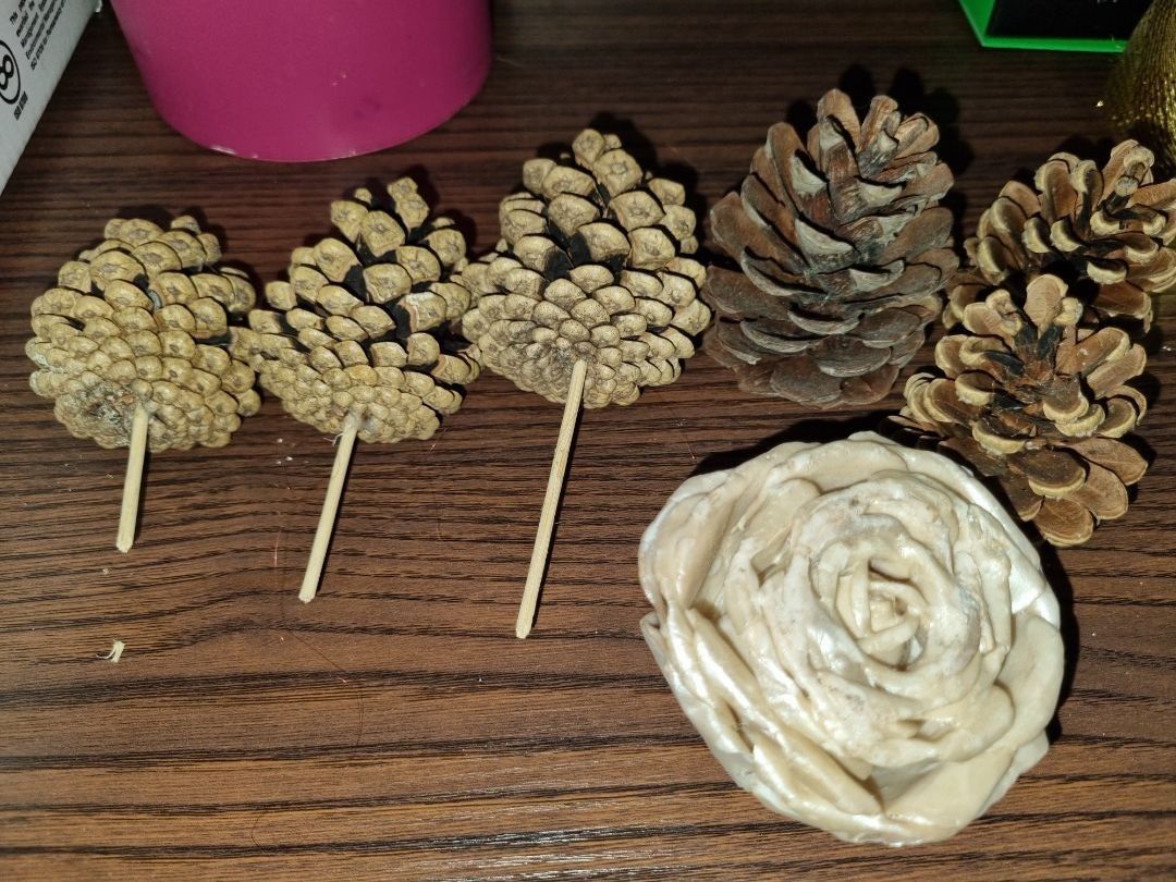 Pine Cones Decor Set (Category: Artificial Plants & Flowers) located in Paombong. Submitted by sweetdeals0181656 (Listing ID 1377572087, Image 1). Description: 6 pieces Pine Cone Set 1 piece Rose made of wax candle Sellers Code Box C.