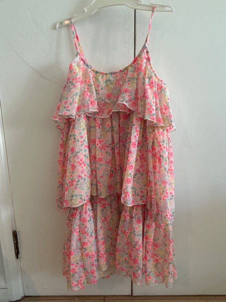 Pink dress (Category: Babies & Kids Fashion) located in Singapore. Submitted by sglife09 (Listing ID 1377617645, Image 3). Description: Size 8,9 years old for girls. Cute fluffy dress, my daughter rarely used as it was not her preference. No delivery, can pass it at Raffles Place MRT or Jurong east MRT etc. .
