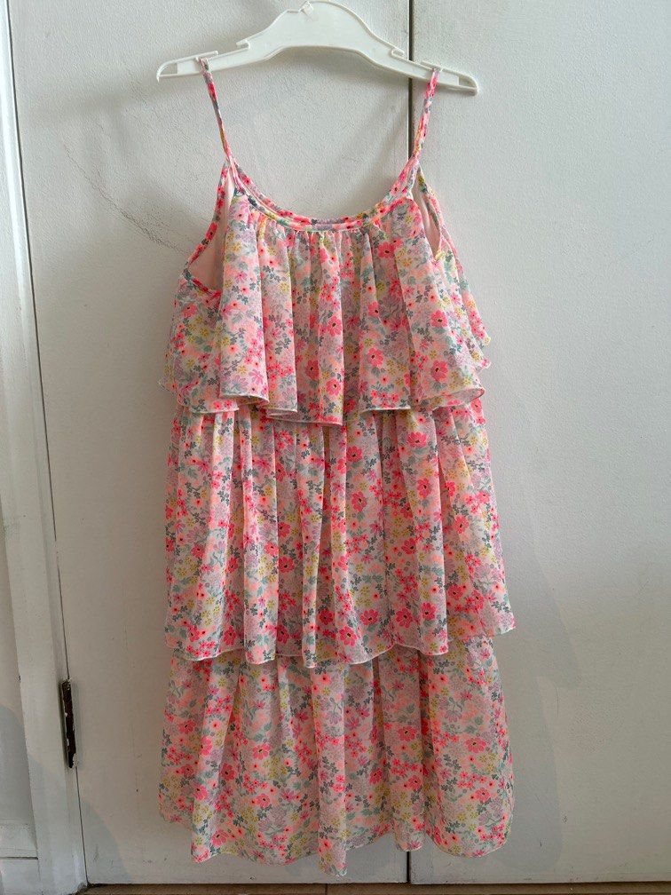 Pink dress (Category: Babies & Kids Fashion) located in Singapore. Submitted by sglife09 (Listing ID 1377617645, Image 1). Description: Size 8,9 years old for girls. Cute fluffy dress, my daughter rarely used as it was not her preference. No delivery, can pass it at Raffles Place MRT or Jurong east MRT etc. .