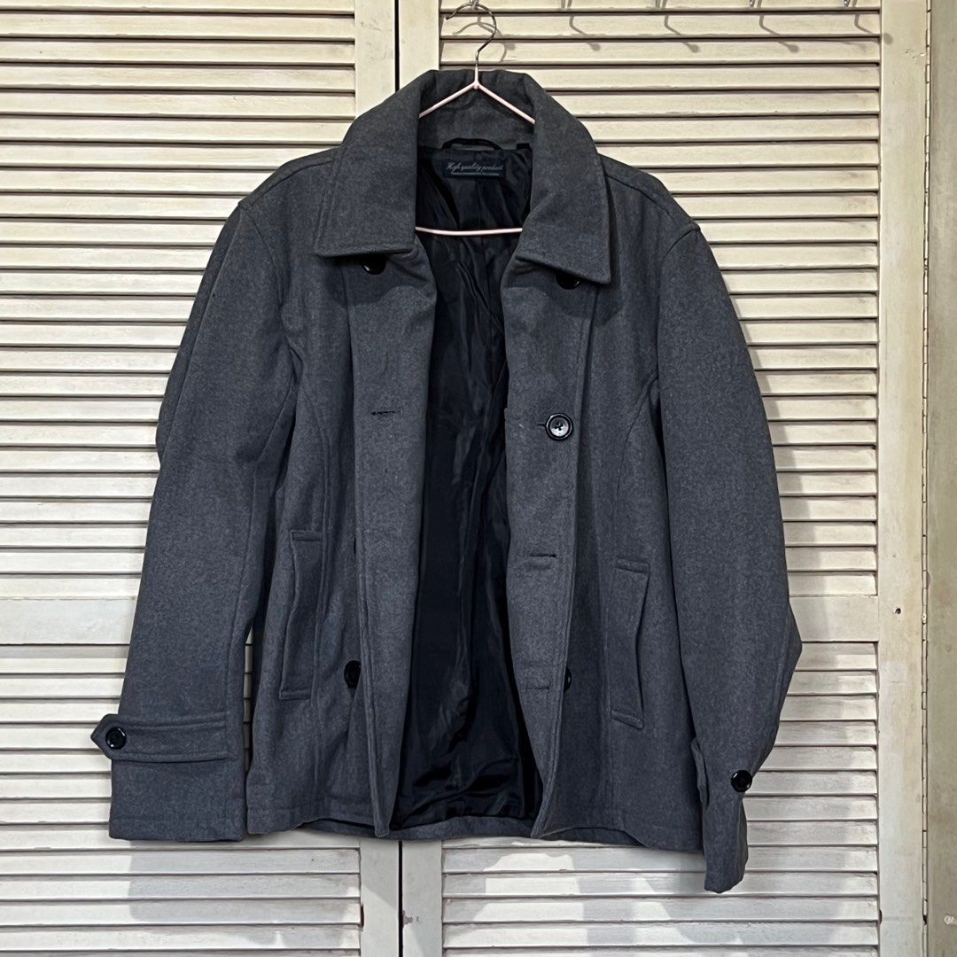 Pocketed/Trench Pea/Coat/Jacket in Dark Gray (Category: Coats, Jackets and Outerwear) located in Paranaque City. Submitted by kdtriestodeclutter (Listing ID 1377675272, Image 1). Description: Thrifted in Osaka, Japan. Light trench coat. With side pockets. Just one missing button but can still be closed. Labelled as Large but good for layering if you’re a Medium. Dimensions Length 25” Width 20” Sleeves length 25.5”.