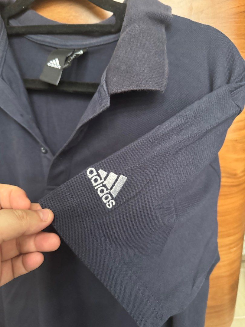 Pre-Owned Adidas Polo Shirt (Category: Tshirts & Polo Shirts ) located in Mandaluyong City. Submitted by 25thdan_ (Listing ID 1377645163, Image 1). Description: Adidas Polo Shirt Navy Blue Medium Flaw: few bleach stains.