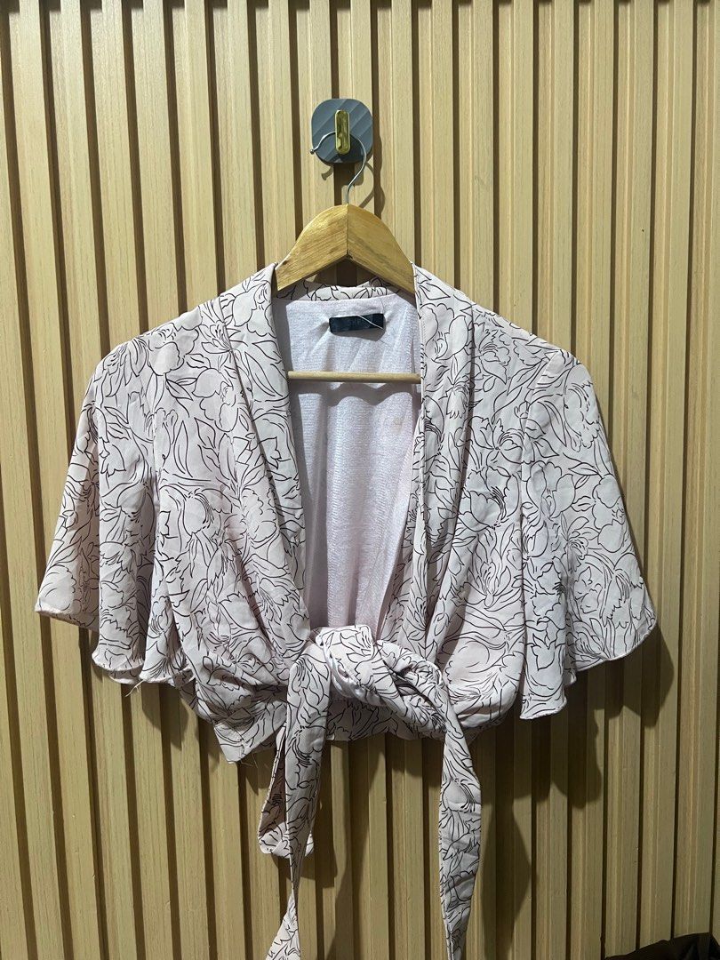 SHEIN Wrap Up Up in Pale Pink (Category: Blouses) located in Cavite. Submitted by lovedbysheee (Listing ID 1377742338, Image 1). Description: Used once size small on tag, fits up to medium. .
