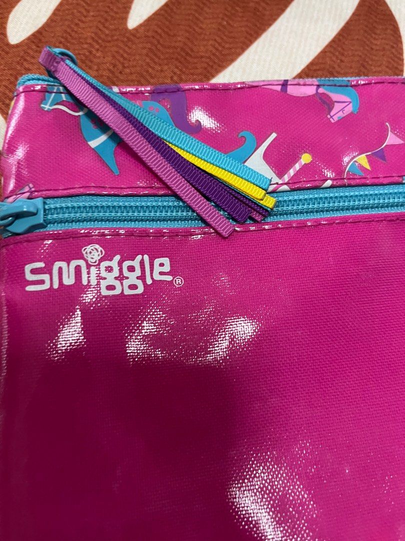 Smiggles carousel theme pencil case long pouch (Category: Stationery & School Supplies) located in Mandaluyong City. Submitted by stephmd (Listing ID 1377654615, Image 2). Description: Preowned Long pouch Double compartment Flaw: sticker mark 4th pic Very few faint ink marks inside 12.5 inches x 7 inches .