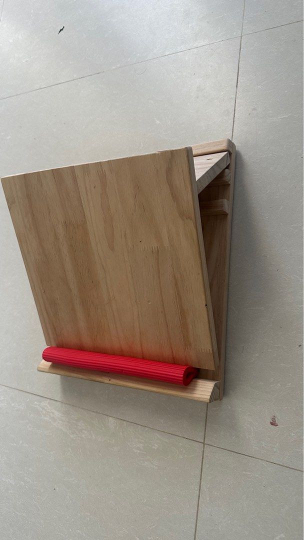 Stretching board for hamstrings & Sciatica (Category: Toning & Stretching Accessories) located in Singapore. Submitted by vinayshetty (Listing ID 1377645068, Image 1). Description: Hey there! Looking for some hamstring relief? This stretching board is your new best friend. It's made of light-colored wood, super simple design, and comes with a handy red foam roller. Great for targeting those tight hamstrings and sciatica. It's in good condition – 