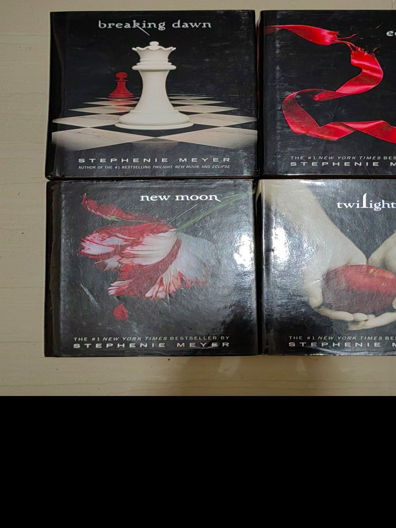 Twilight Bookset Hard Bound by Stephenie Meyer | Twilight Saga (Category: Storybooks) located in San Juan City. Submitted by mizerruki (Listing ID 1377734197, Image 3). Description: Sold as set. Pages are tanning. Please see photos. Twilight Eclipse New Moon Breaking Dawn.