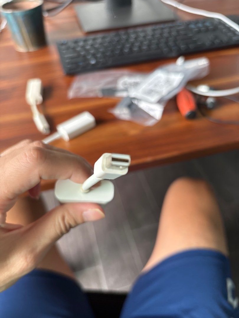 VGA to lightning and Ethernet to lightning adapters (Category: Cables & Adaptors) located in Singapore. Submitted by gainas (Listing ID 1377584192, Image 3). Description: Genuine Apple VGA adapter. Connects your Mac to a VGA display or projector. Shows some signs of use, but fully functional. Includes the adapter itself, as shown in the photos. Perfect for presentations or extending your display..