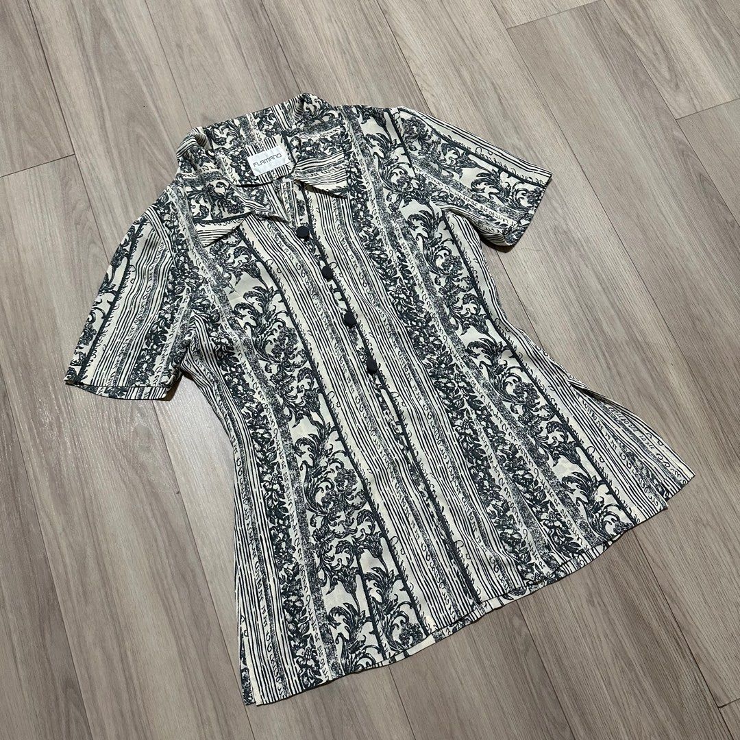 Vintage Button-Up Blouse (Category: Blouses) located in Singapore. Submitted by carousae (Listing ID 1377588595, Image 1). Description: Features a unique blue-grey and cream floral and striped pattern. Short-sleeved with a button-up front. Best fit uk 8. Free tracked mail.