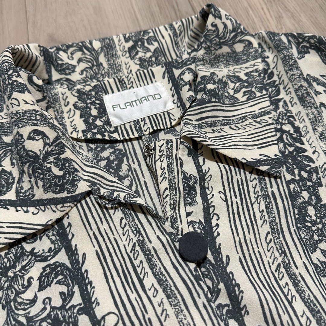 Vintage Button-Up Blouse (Category: Blouses) located in Singapore. Submitted by carousae (Listing ID 1377588595, Image 3). Description: Features a unique blue-grey and cream floral and striped pattern. Short-sleeved with a button-up front. Best fit uk 8. Free tracked mail.
