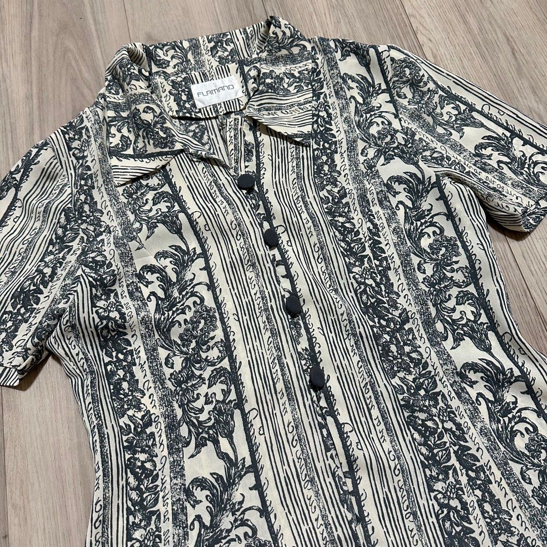 Vintage Button-Up Blouse (Category: Blouses) located in Singapore. Submitted by carousae (Listing ID 1377588595, Image 2). Description: Features a unique blue-grey and cream floral and striped pattern. Short-sleeved with a button-up front. Best fit uk 8. Free tracked mail.