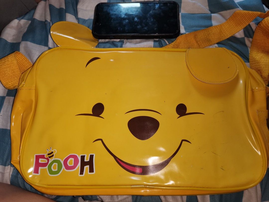 Winnie the Pooh kid's bag (Category: Cross-body Bags) located in Quezon City. Submitted by emsparkle (Listing ID 1377653132, Image 1). Description: Cute in actual Slight dirts inside.