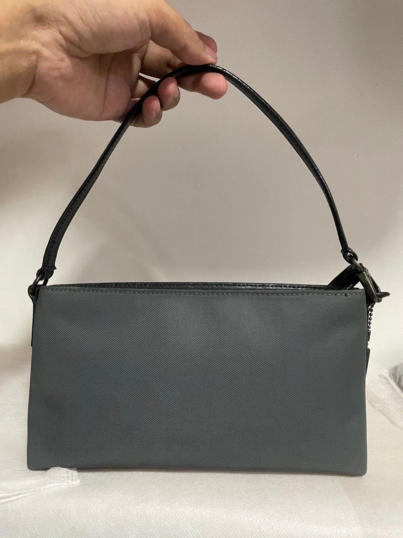 Authentic Coach mercer twill demi pouch gray (Category: Luxury Bags & Wallets) located in Guiguinto. Submitted by prelovedinc2024 (Listing ID 1372706164, Image 2). Description: guaranteed authentic, bought in Japan with signs of use size: 9.5x5x1.5”.