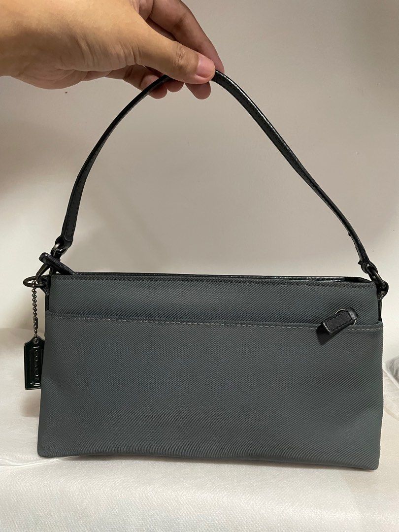 Authentic Coach mercer twill demi pouch gray (Category: Luxury Bags & Wallets) located in Guiguinto. Submitted by prelovedinc2024 (Listing ID 1372706164, Image 1). Description: guaranteed authentic, bought in Japan with signs of use size: 9.5x5x1.5”.