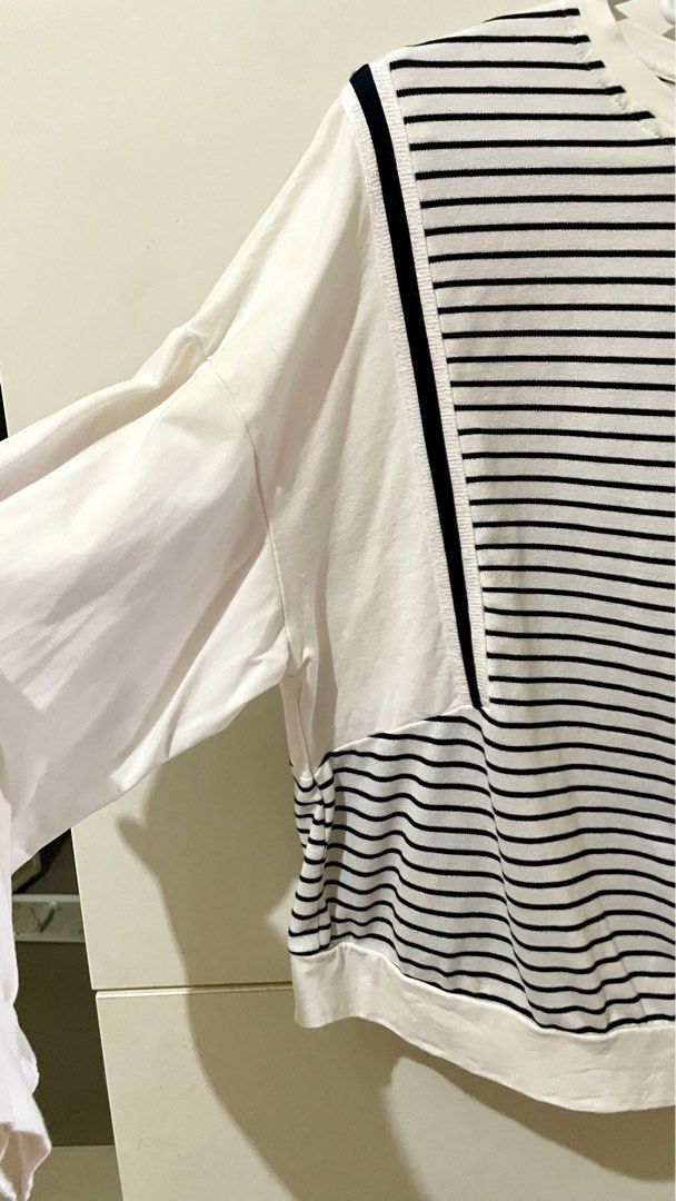 Cotton long sleeve shirt (Category: Shirts) located in Taguig. Submitted by lam_decluttering (Listing ID 1372759159, Image 3). Description: Striped white and black cotton long sleeve shirt can fit small to medium.