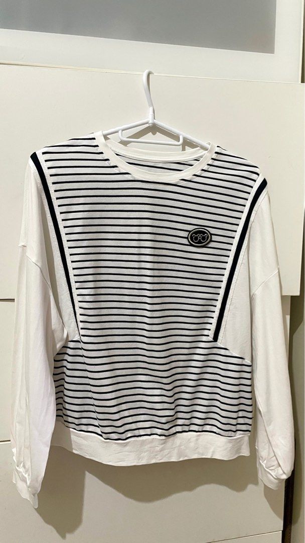 Cotton long sleeve shirt (Category: Shirts) located in Taguig. Submitted by lam_decluttering (Listing ID 1372759159, Image 1). Description: Striped white and black cotton long sleeve shirt can fit small to medium.