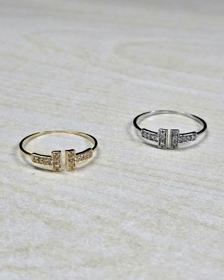 Dainty Diamond T Ring in 18k gold (Category: Rings) located in Manila. Submitted by shoppe_22 (Listing ID 1372686458, Image 1). Description: - 0.10 carat natural diamond - round brilliant cuts 💎 - with certificate ❗️ - Japan gold setting - size 6 (slightly adjustable) - free box - around grams 0.7g only - slightly negotiable - free shipping for non COD/COP orders.