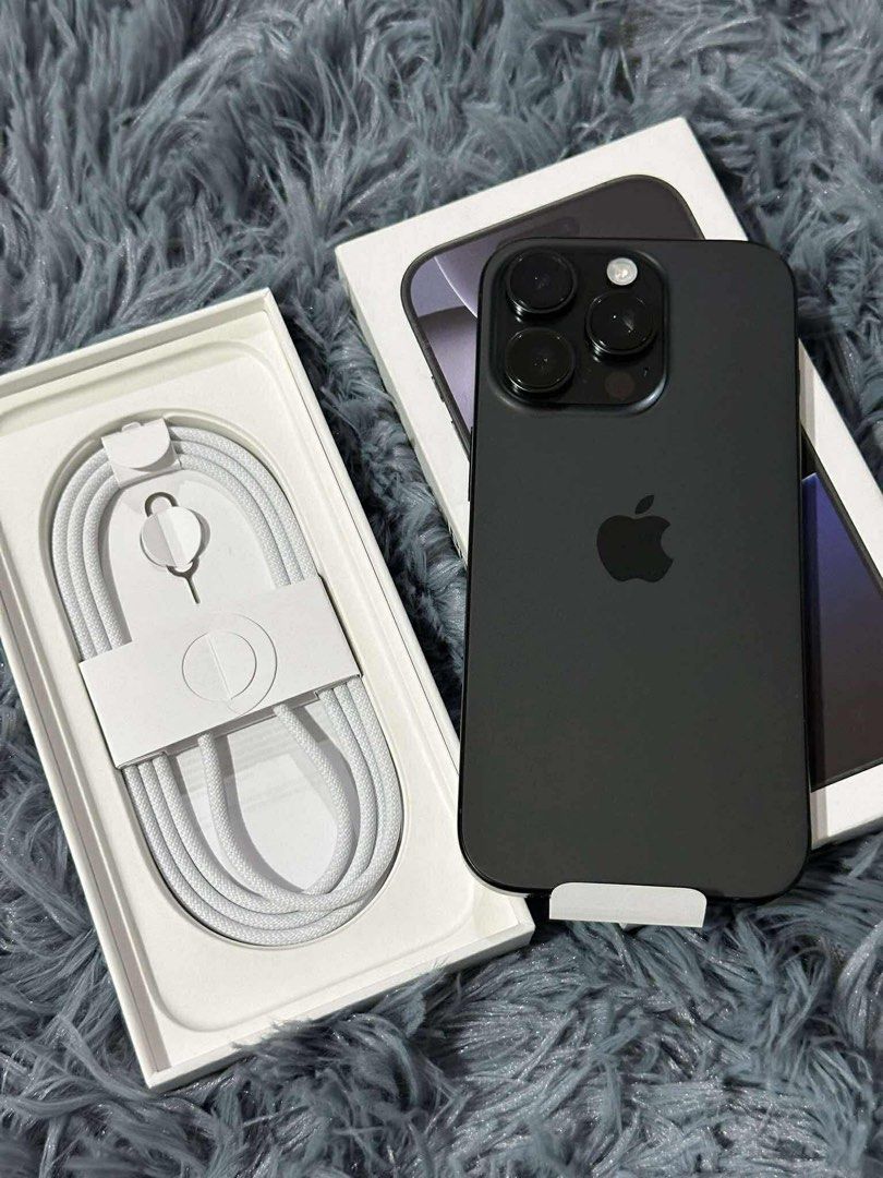 Iphone 16 Pro (Category: iPhone 16 Series) located in Cavite. Submitted by mcboutiquecollection (Listing ID 1372831637, Image 2). Description: SALE BRANDNEW iPhone 16 Pro 128 GB Smartlocked Black Titanium •Brandnew, opened for checking only •Warranty until May 17, 2026 •100% battery health •1 cycle count only •Smooth and no issues!! Complete with original box same imei, unusrd original cord, manuals Free tempered glass, case, 20w adapter .