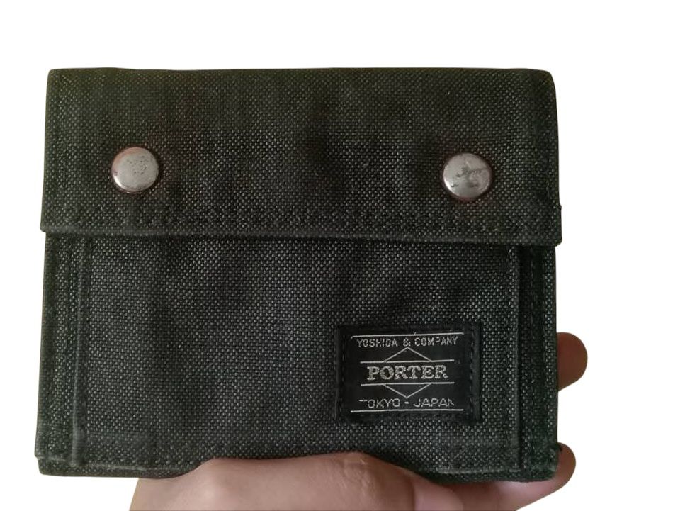 Japan Porter Men's Wallets (Category: Wallets & Card Holders) located in Makati City. Submitted by allgoodsthrifts (Listing ID 1372737476, Image 1). Description: Need wash only Excellent Condition 3500 free shipping via jnt! Makati Guadalupe Loc..