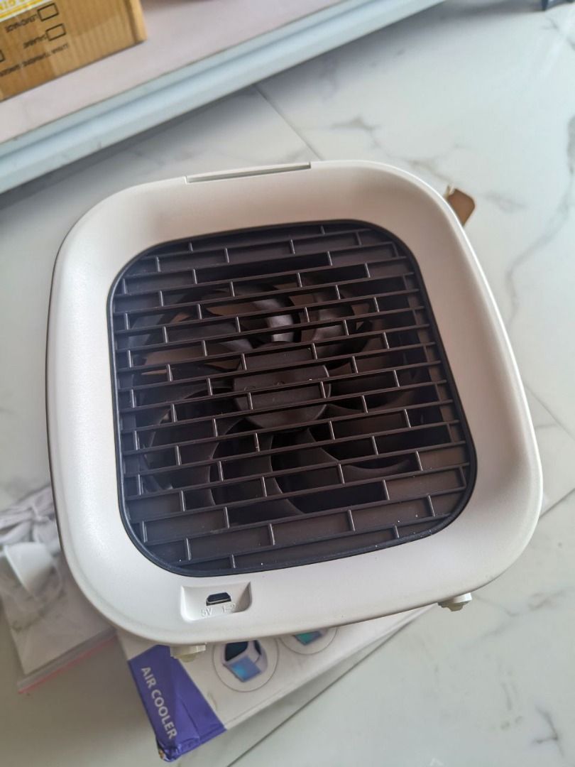 Mini Portable Air Cooler (Category: Fans) located in Valenzuela. Submitted by onhoco (Listing ID 1372687306, Image 3). Description: Air Cooler for only 550.00 ✅ Swak ngayon summer, pwede lagyan ng malamig tubig. ✅ Space saver ✅ with LED light ✅ pwedeng gawing lamp ✅ pwede lagyan ng cold water / ice.