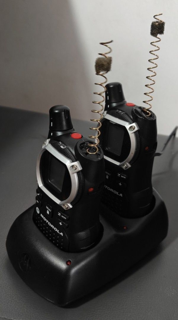 Motorola EM1000R two-way radios (Category: Walkie-Talkie) located in Singapore. Submitted by michelinvvr (Listing ID 1372811888, Image 1). Description: Key features of the Motorola EM1000R include: 22 Channels: for communication. Hands-free operation: with voice-activated transmission. LED flashlight: for emergencies. Mini-USB charging port: for convenient charging. The radios operate using a transmitter and receiver, with an antenna to send and 