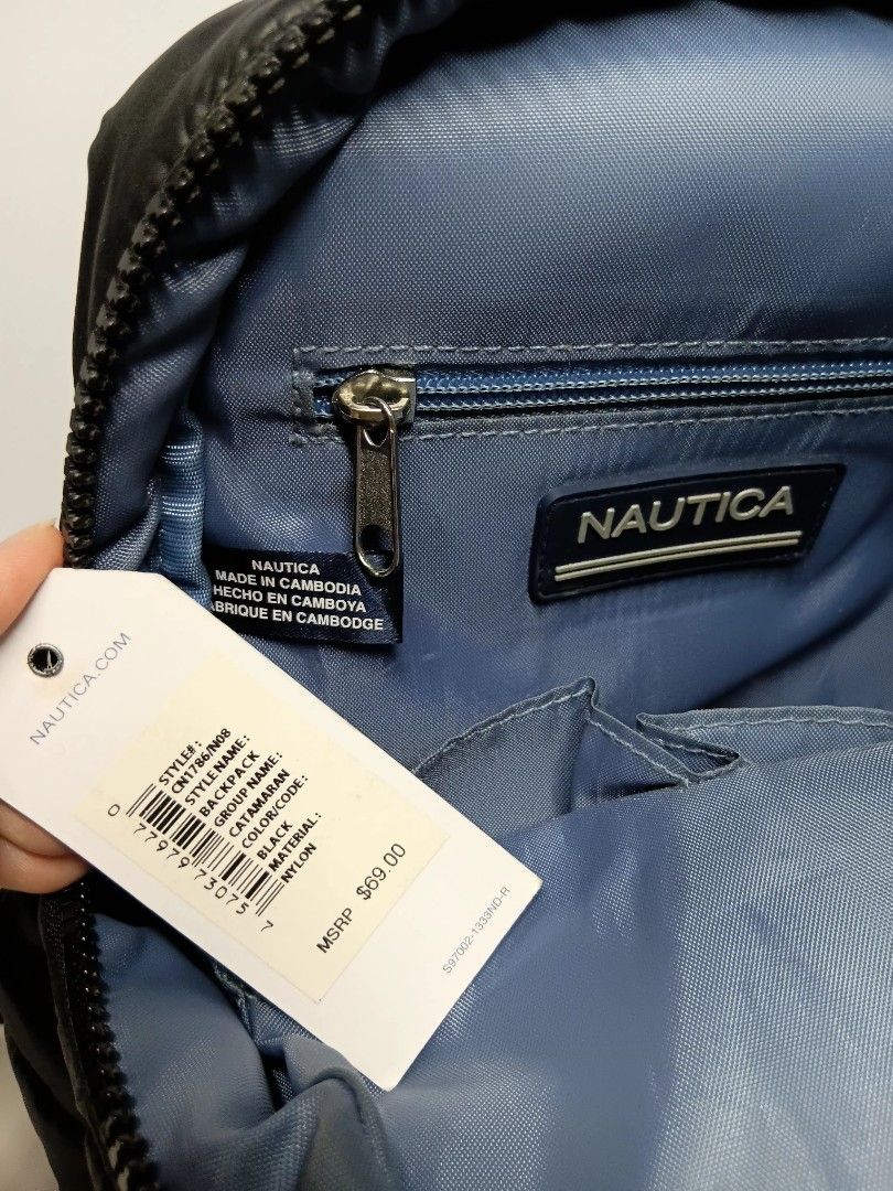 NAUTICA Nylon Backpack mini compact original (Category: Backpacks) located in Quezon City. Submitted by hapyllein (Listing ID 1372749187, Image 2). Description: Decluttering. Need a bit of cleaning or simply wiping. Has minor flaws at the bottom. Shown in last photo. ❎️ low ballers will not be entertained.