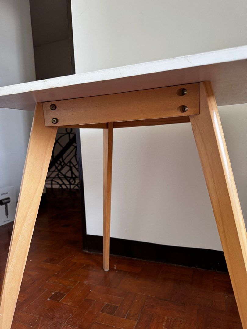 Scandinavian Style Wood Table (Category: Tables & Sets) located in Paranaque City. Submitted by lazyskates (Listing ID 1372819612, Image 2). Description: Scandinavian Style Wood Table Used 8/10 condition 60x60x70cm Php1200 negotiable! Issues: chipping on top edge and bottom part of legs (see pics for details) RFS: not being used anymore Pick-up at Parañaque.