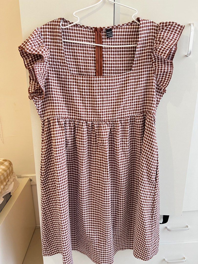 Shein gingham brown dress (Category: Dresses) located in Bulacan. Submitted by lezzdeclutter (Listing ID 1372761316, Image 1). Description: Shein gingham brown dress -size Large -NO flaws -measurements are already posted -used once 📍Malolos, Bulacan Shipping via j&t or lalamove .