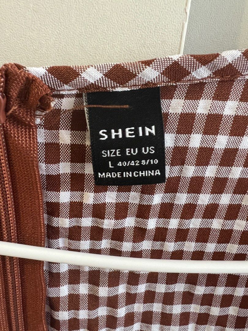Shein gingham brown dress (Category: Dresses) located in Bulacan. Submitted by lezzdeclutter (Listing ID 1372761316, Image 3). Description: Shein gingham brown dress -size Large -NO flaws -measurements are already posted -used once 📍Malolos, Bulacan Shipping via j&t or lalamove .