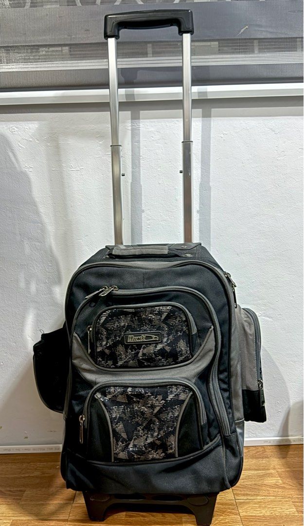Trolley type bag Hawk brand (Category: Backpacks) located in Santa Rosa. Submitted by joyceeebles (Listing ID 1372812236, Image 1). Description: Trolley-type school bag with free bag rain cover (HAWK BRAND) Selling my son’s pre-loved stroller bag 1 year lng ginamit. Honest issue: may tahi yung lagayan ng tumbler kasi medyo malaki yung tumbler na ginamit nya dito. (Hindi nman super halata kasi color black ) dirt and dust from previous use, nothing