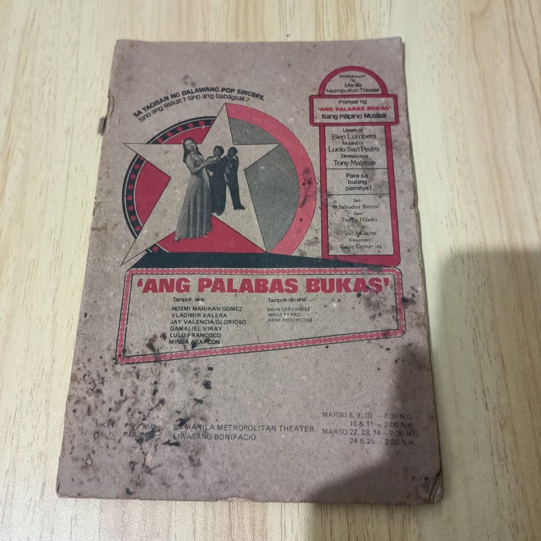 VINTAGE 1978 Theater Booklet (Category: Storybooks) located in Quezon City. Submitted by niqcb (Listing ID 1372798338, Image 1). Description: Rare 1978 Theater Booklet of Ang Palabas Bukas on the Manila Metropolitan Theater Rare images of figures such as Imelda Marcos, Behn Cervantes, Angie Ferro, and a young Rene Requiestas Heavily damaged (see image), handle with care Location: Tandang Sora, Quezon City.