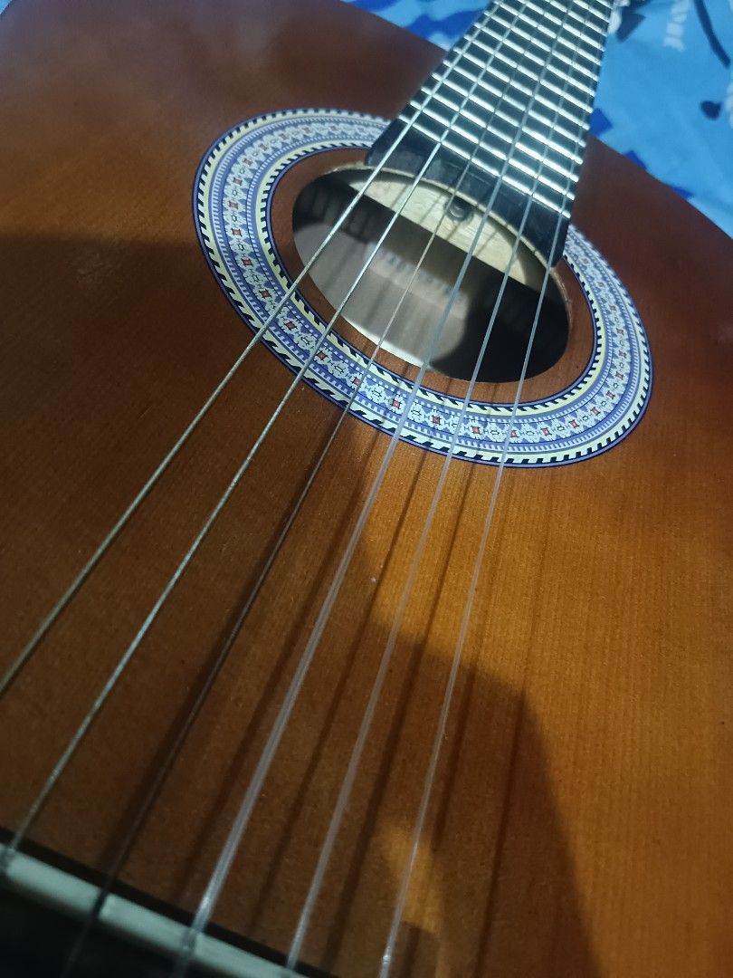 vintage classical guitar (Category: Musical Instruments) located in Manila. Submitted by Jazzer.17 (Listing ID 1372853489, Image 3). Description: vintage classical nylon guitar,rosewood fret board 37 inches size,truss rod w serial number.,,price,3,500 pesos.